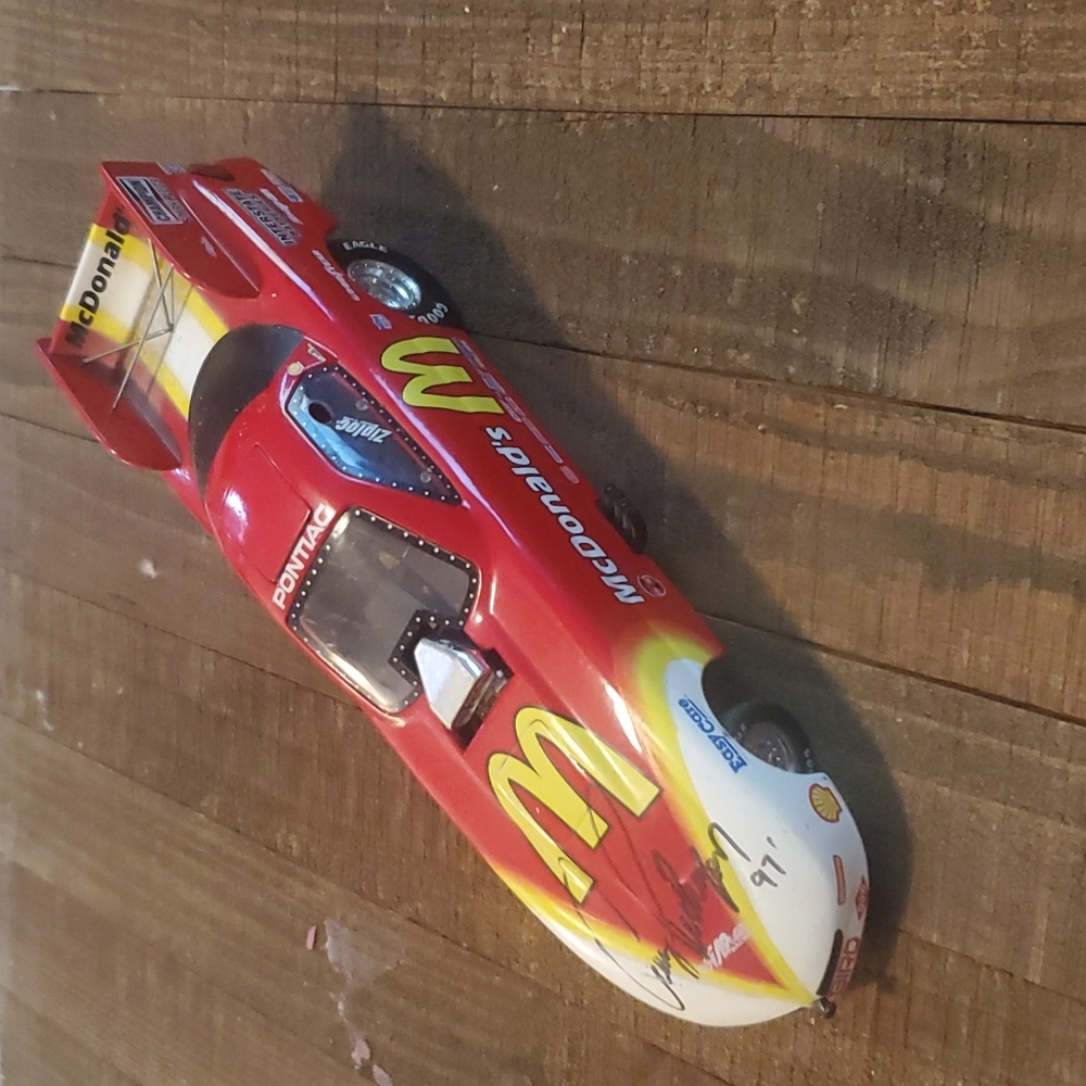 McDonald's NHRA Action funny car with signature if Cruz Pedregon 1997.